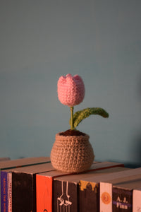 Handmade crochet pink tulip in a rustic brown pot, second view
